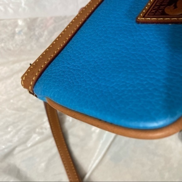 Dooney and Bourke blue leather wristlet bag